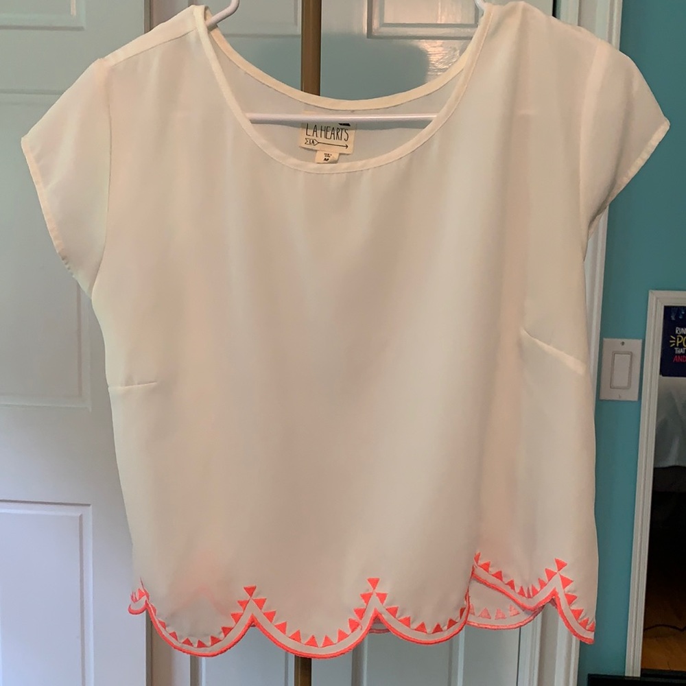Cropped sheer white top with scalloped neon bottom